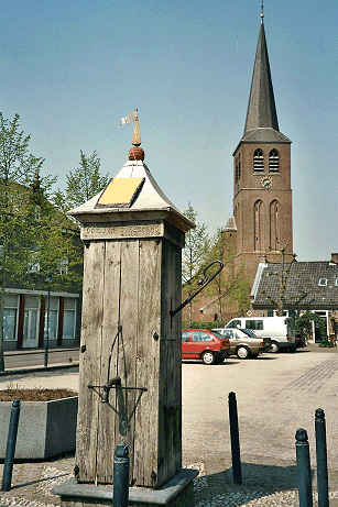 Picture of the renovated old pump in the town square  of Lottum, Limburg, Netherlands