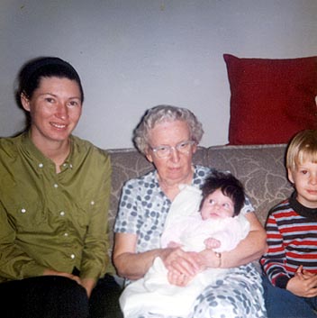 Picture of Maryhelen Arnold,with Great-Grandmother Hilda G. Willis, mother Sandra Willis Arnold and brother Billy Arnold, Easton,Maryland March 1974