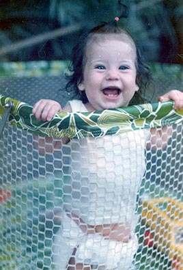 Picture of Maryhelen Arnold, playing outside in playpen on Grand Turk Island, Turks and Caicos, BWI  1974