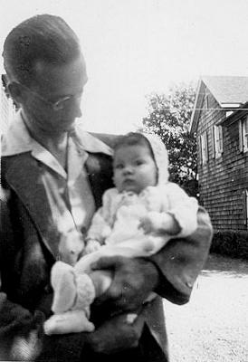 Picture of Sandra Lee Willis, age 2 months, held by father L. Roy Willis, Jr., Easton, Maryland September 1941