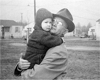 Picture of Sandra Lee Willis held by her Granddaddy L. Roy Willis, Sr., age 18 months, Aberdeen, Maryland January 1943